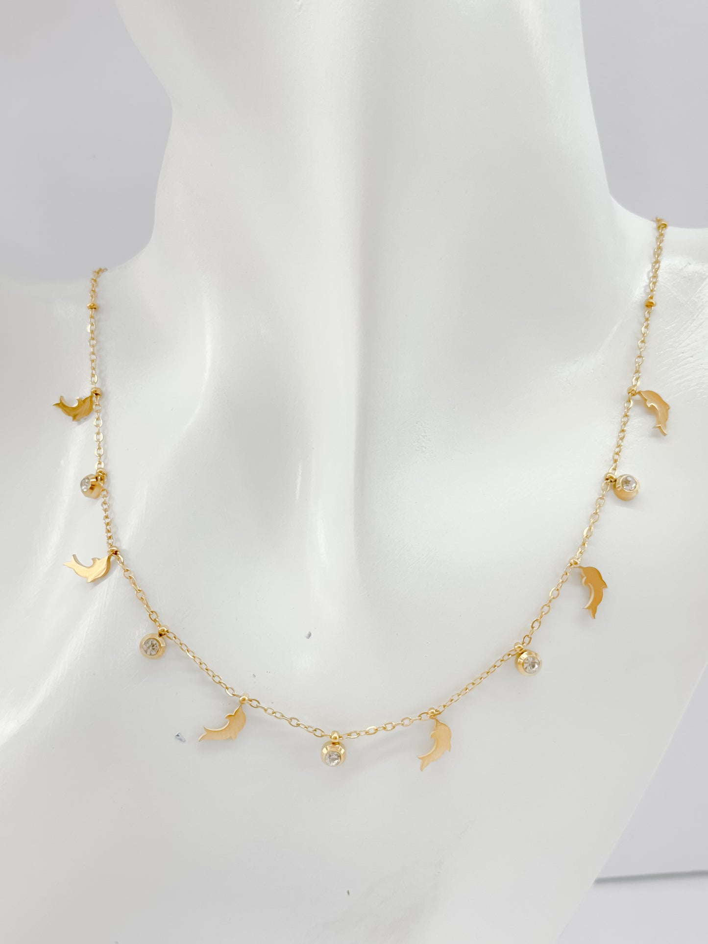 GOLDEN DOLPHIN DELIGHT WITH WHITE STONES